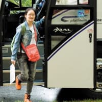 Girl coming down to th charter atlanta bus